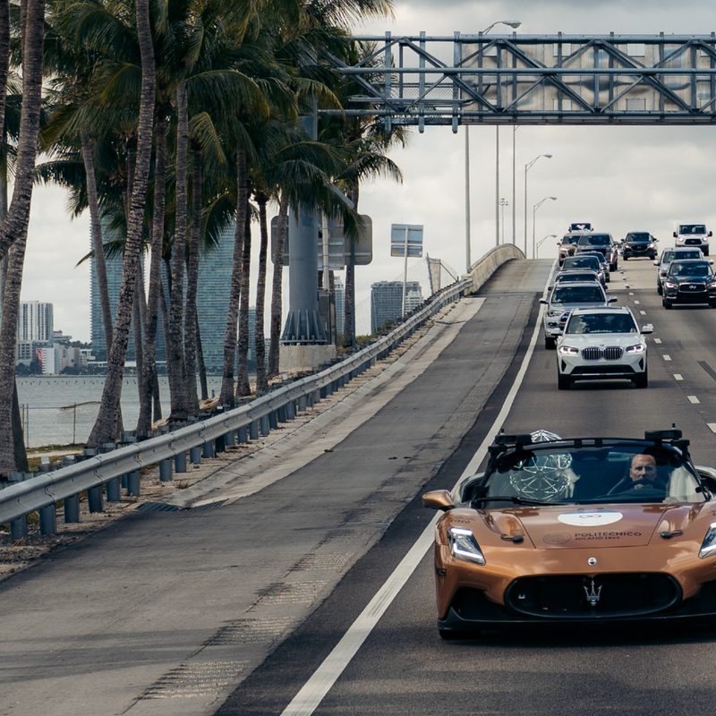 A team member driving the Maserati MC20 Cielo convertible that was part of an autonomous driving convoy across Italy in 2022.