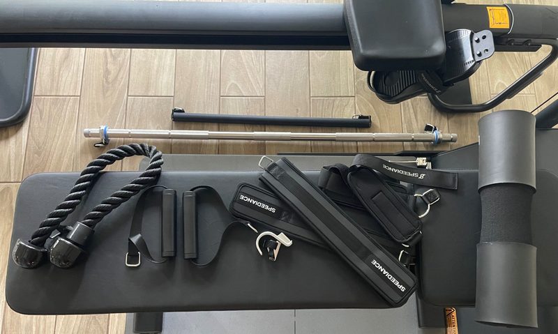 Accessories on bench for Speediance Gym Monster 2 gym machine