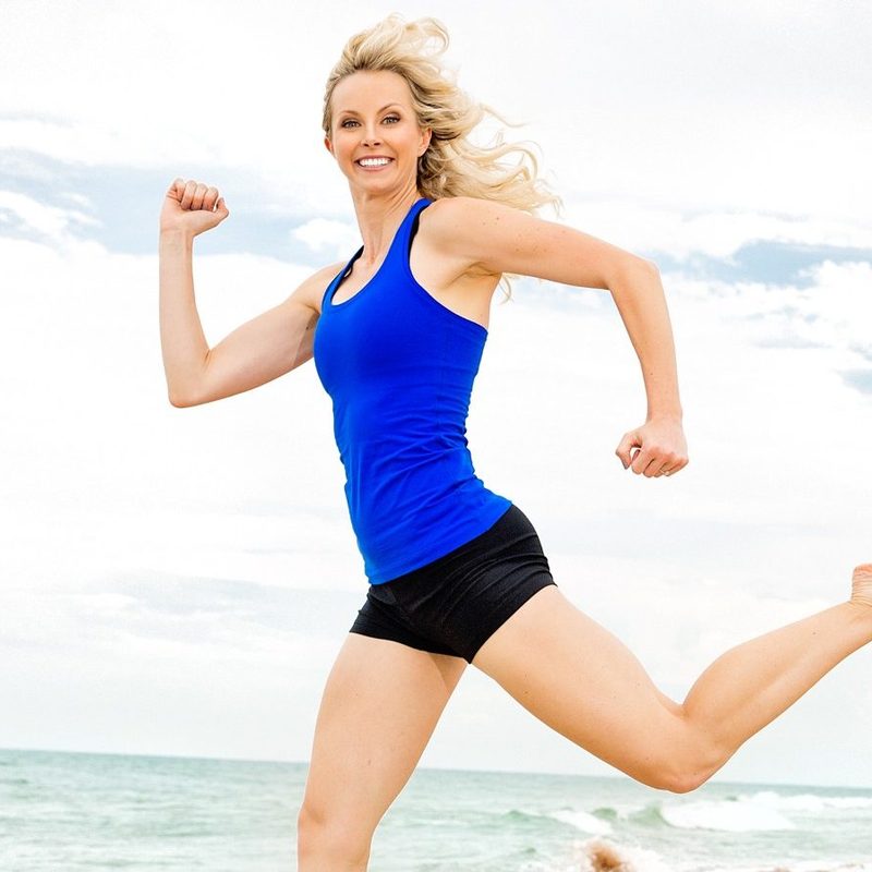 Carissa Galloway running jumping on beach