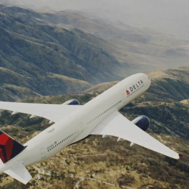 Delta plane over mountains