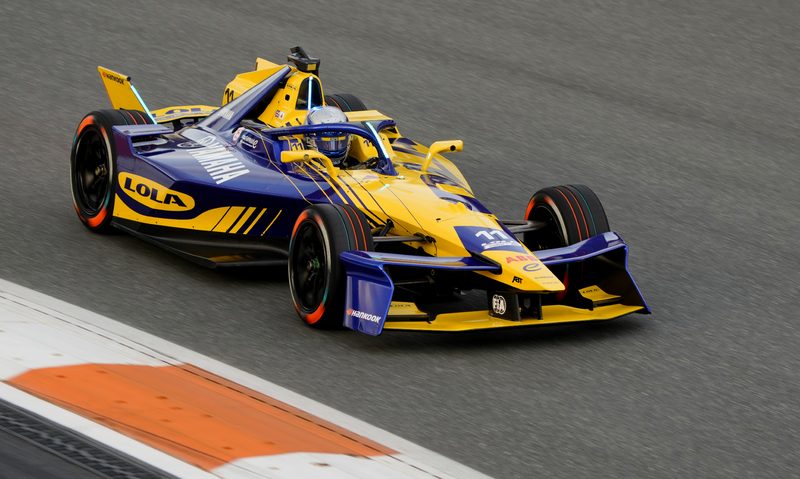 Driver 61 in a race car.