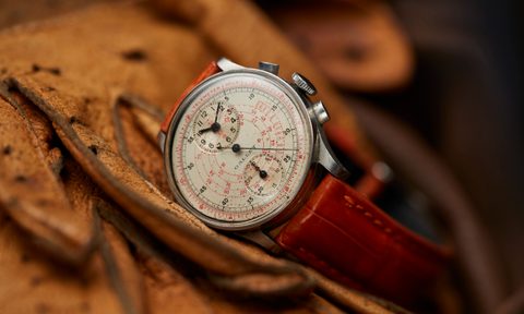 Watch on brown background
