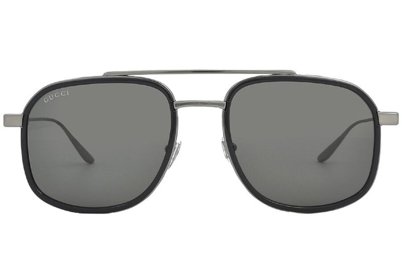 The Gucci Grey Navigator sunglasses on a white background.