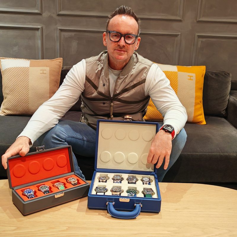Wrist Afficionado's Eddie Goziker with two cases of rare watches