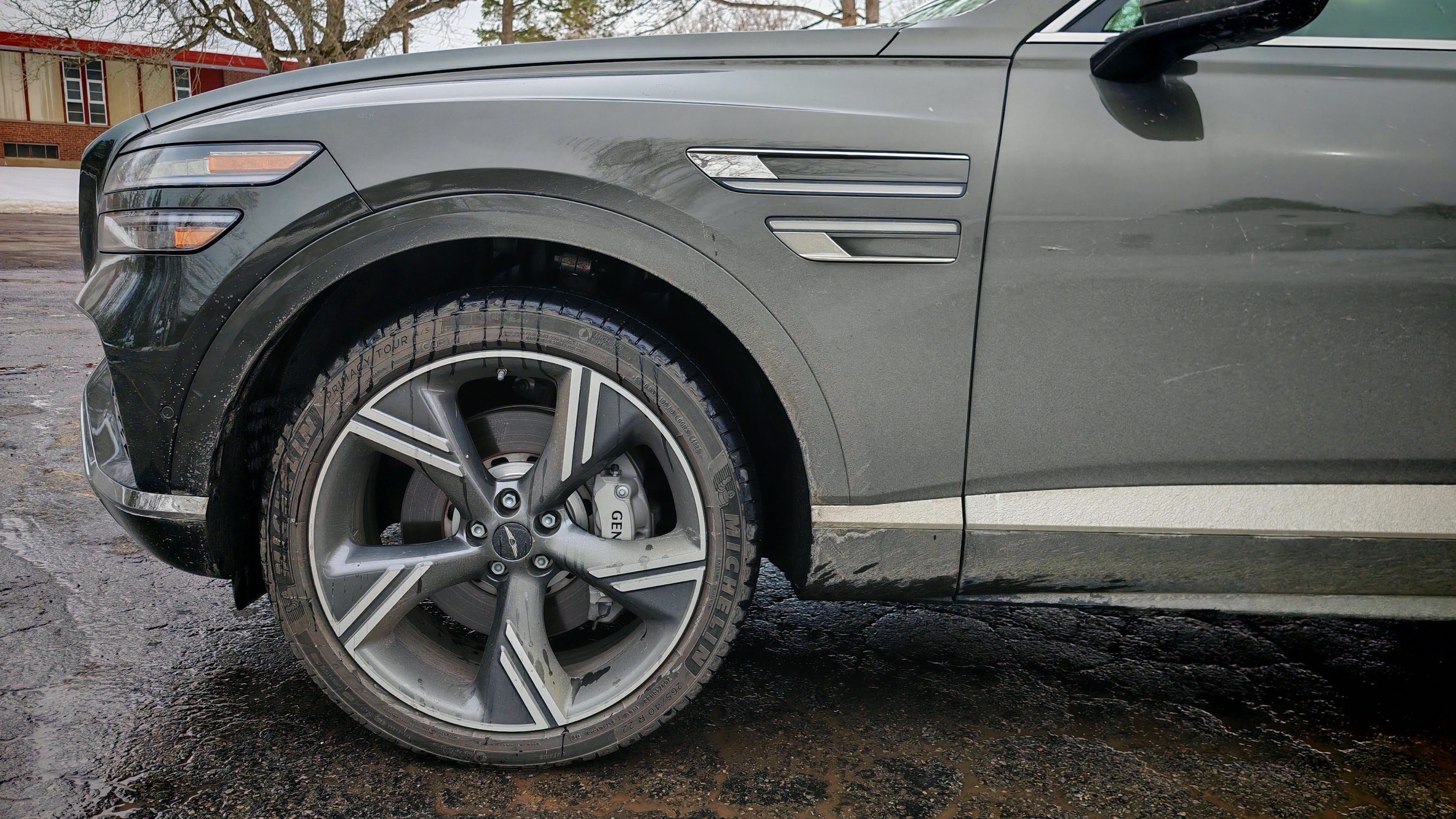 The front fender and wheel of a Genesis GV80 Prestige