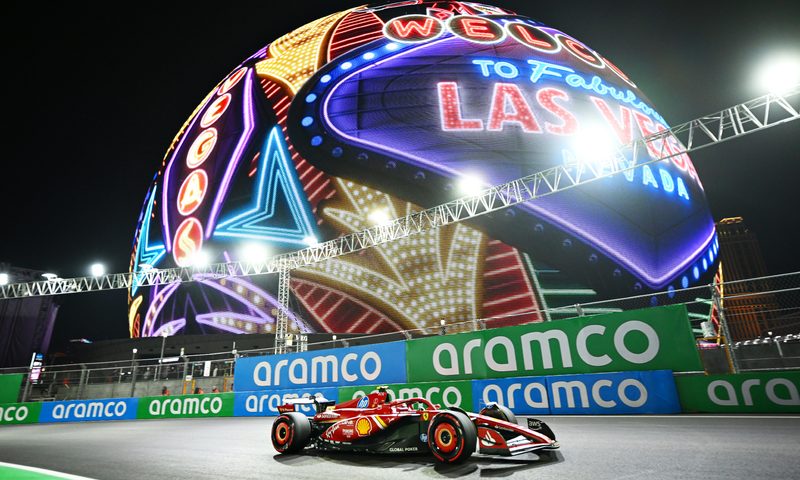 Las Vegas Grand Prixon the Las Vegas Strip Circuit, Carlos Sainz on the track with the Sphere in the background.