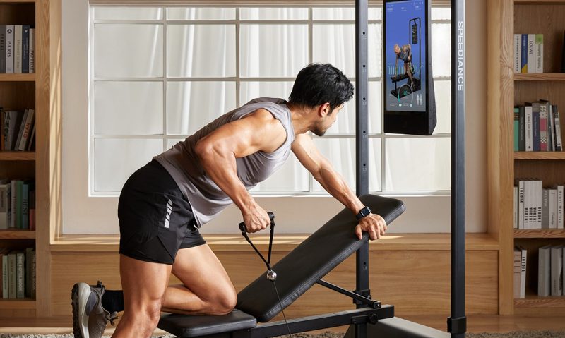Man working out exercising row on Speediance Gym Monster 2 machine