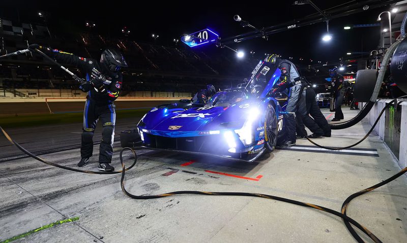 Pit crew working on 2025 V-Series R race car at Daytona.