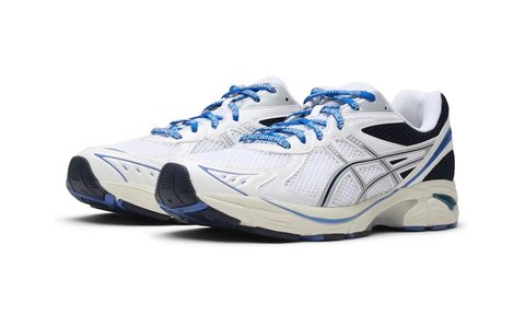pair of somewhere and asics sneakers