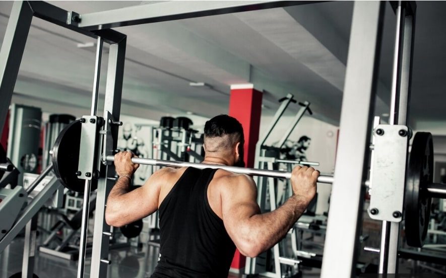 Man using Smith machine