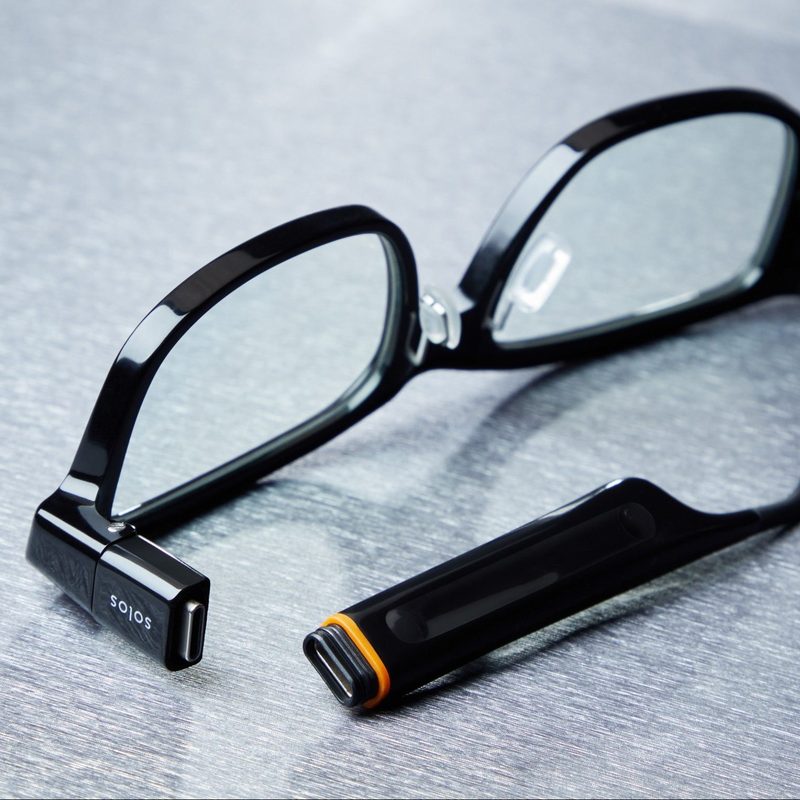 Solos AirGo 3 Black Glasses with the USB-C Charger exposed