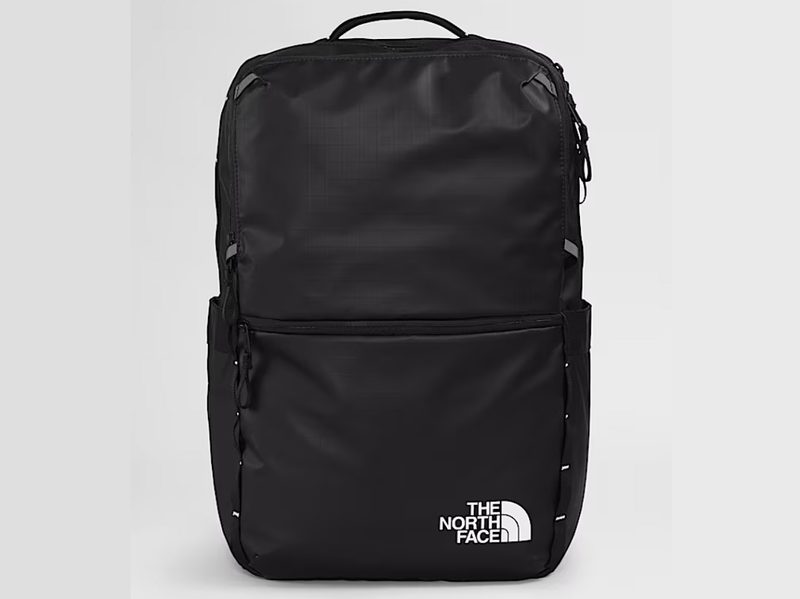 The North Face Base Camp Voyager Daypack on a gray background.