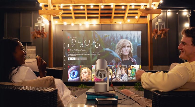 Couple watching Netflix on the XGIMI projector