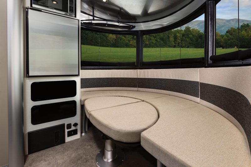 Convertible dinette/bed inside the 2025 Airstream Basecamp 20Xe electric travel trailer.