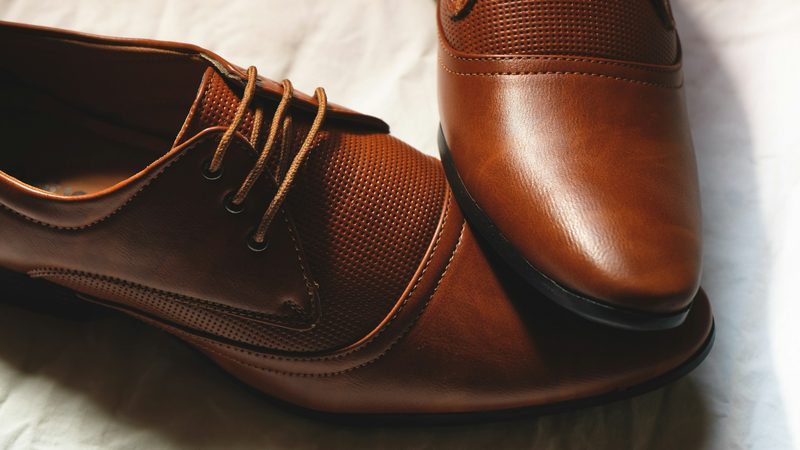 close up on brown leather shoes