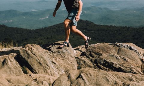 Man hiking in sandals
