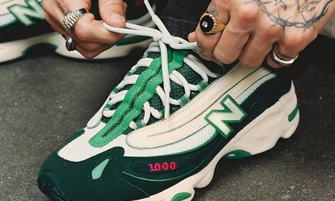 man tying new balance cncpts sneaker