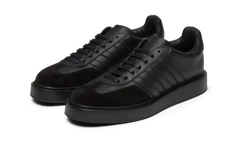 pair of black adidas gazelle made in italy sneakers