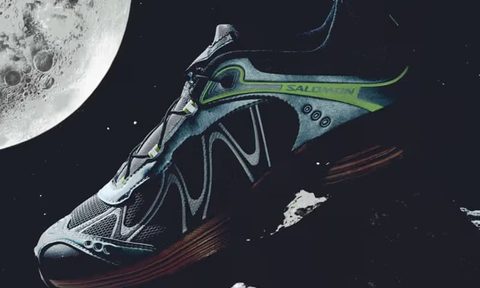 salomon sneaker on rock