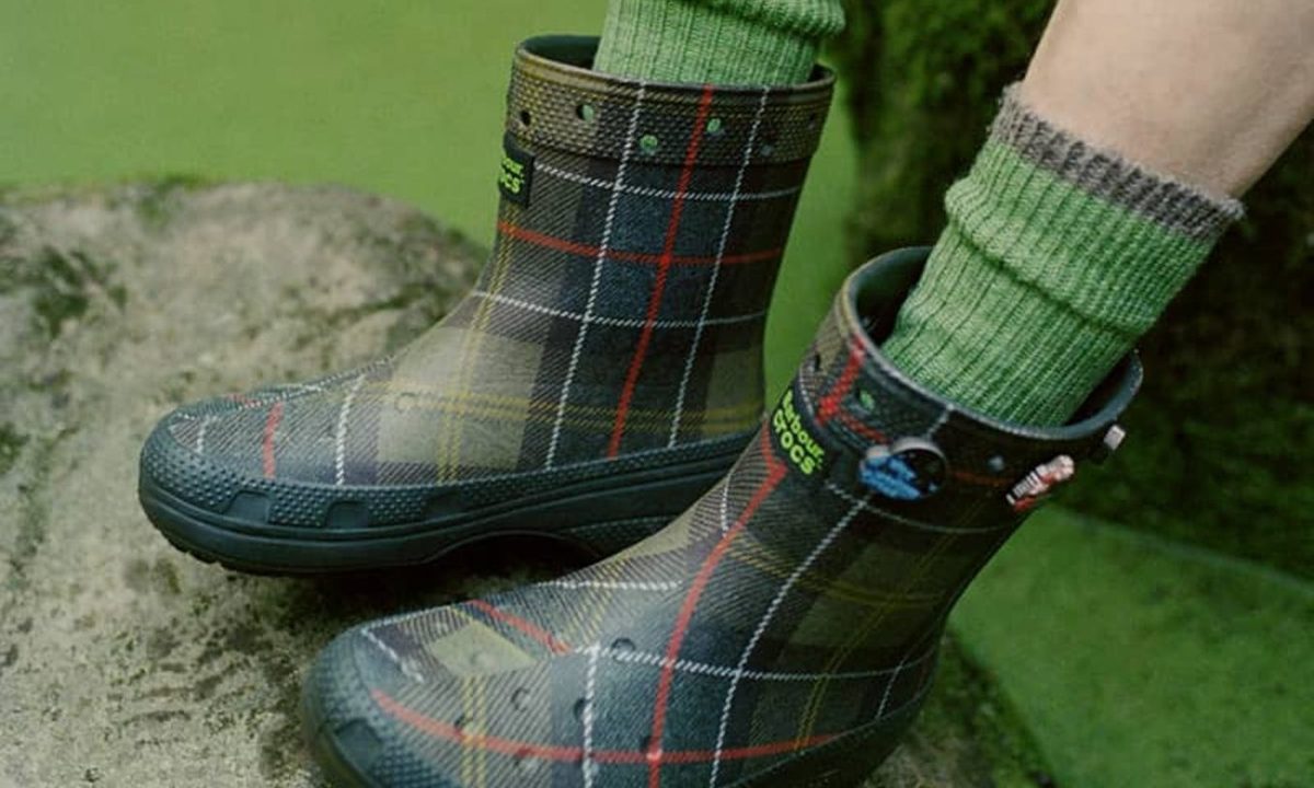 man wearing barbour crocs wellington boots