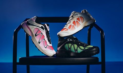 three salomon sneakers on chair
