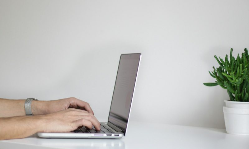 man on computer lapto