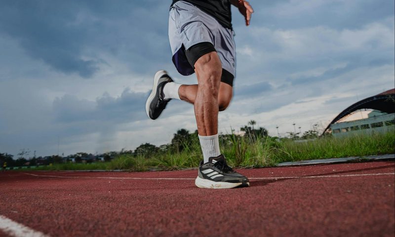 man running outdoors on track