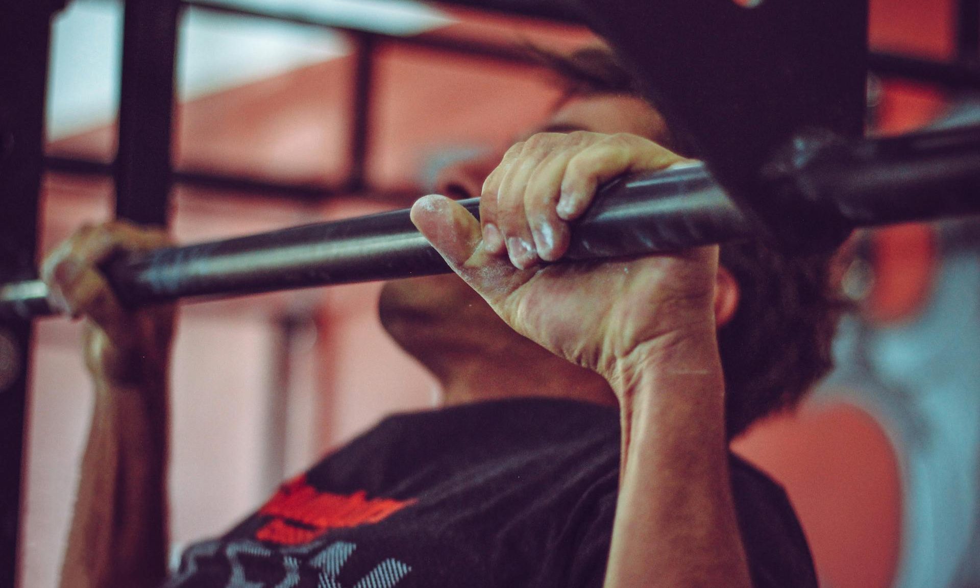 Man using pull-up bar
