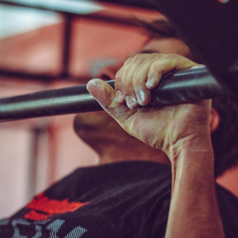 Man using pull-up bar