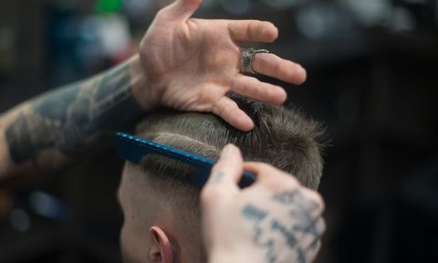 Man getting haircut, view from back