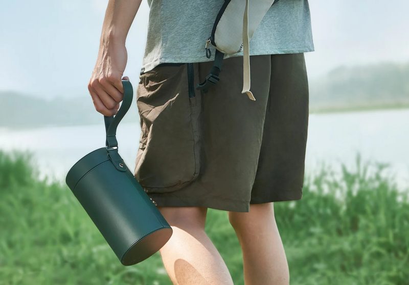 A man carrying the XGIMI portable projector case in his hand