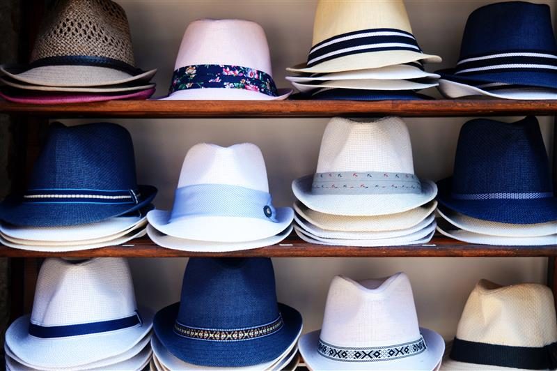 Panama hats of various styles and colors