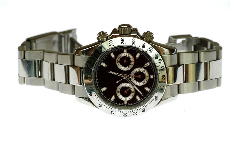 Rolex wrist watch isolated on white background.
