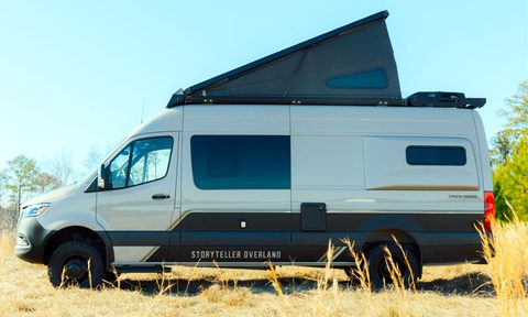 Storyteller Overland Crew Mode adventure van camper with its rooftop tent popped.