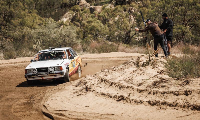 1980 Toyota Corolla rally car on the track in the Hoonigan Rally Speedrun Championship.