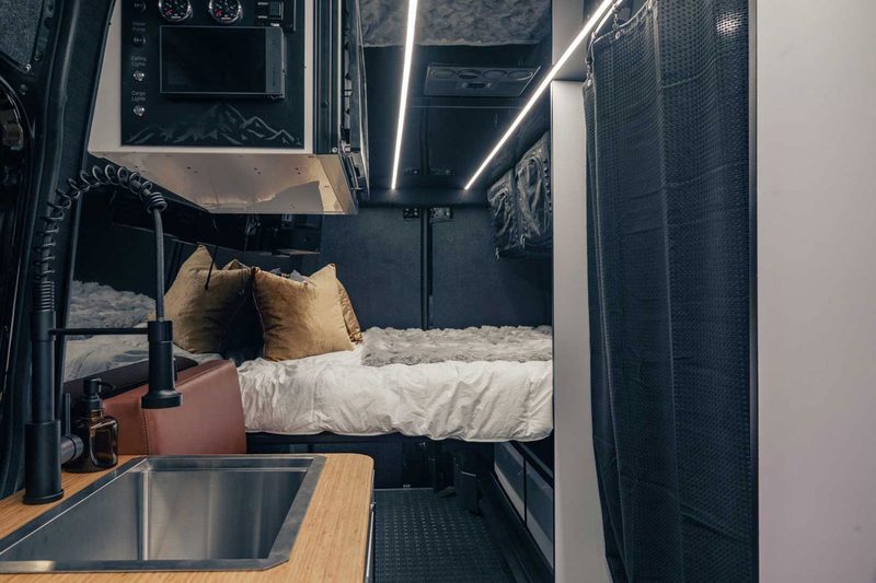 Looking toward the rear interior of 27North's Venture X adventure campervan.