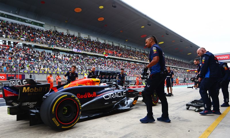Calum Nicholas with the Red Bull Racing pit crew at the Chinese Grand Prix 2024.