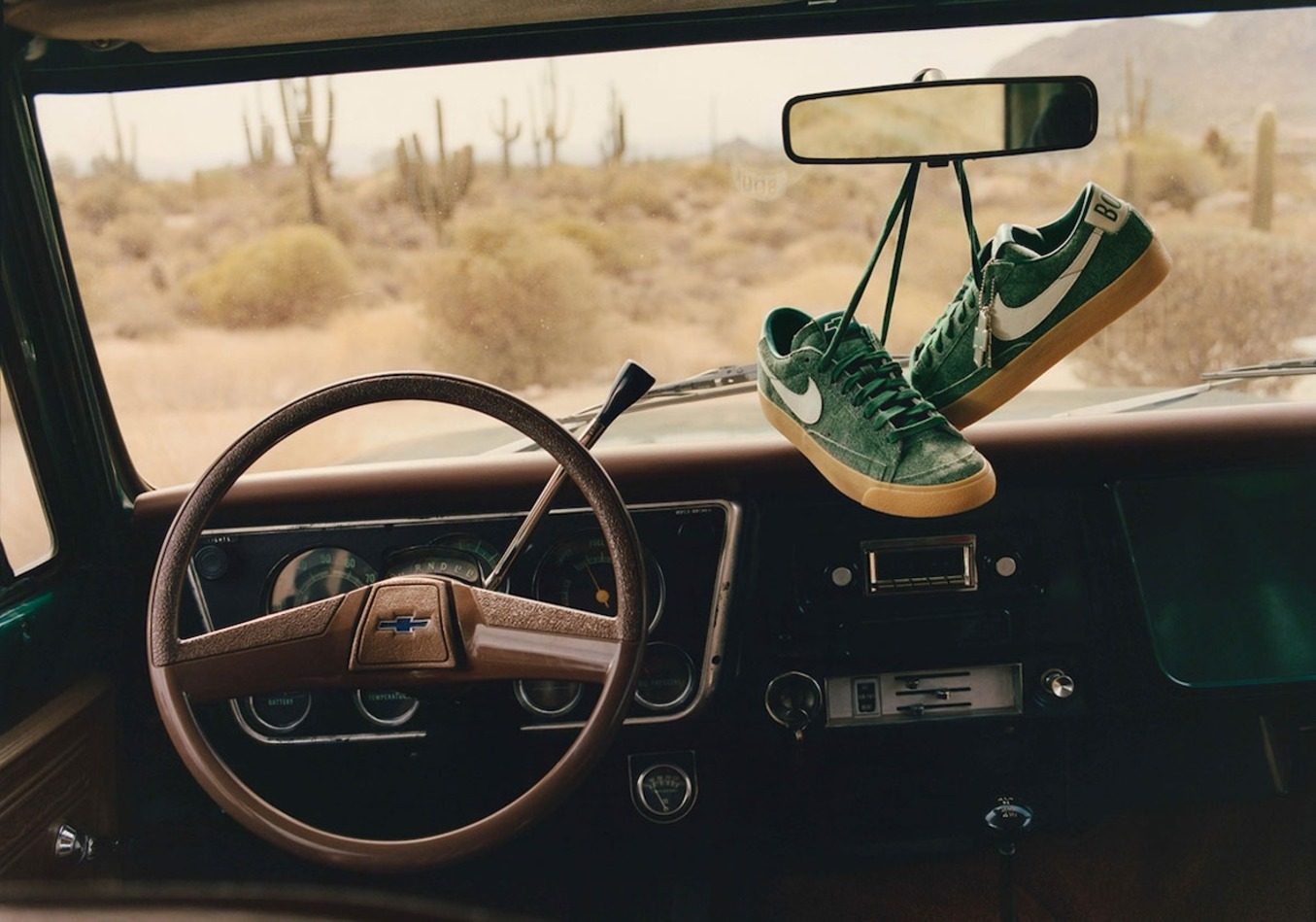shoes hanging on chevy rearview mirror