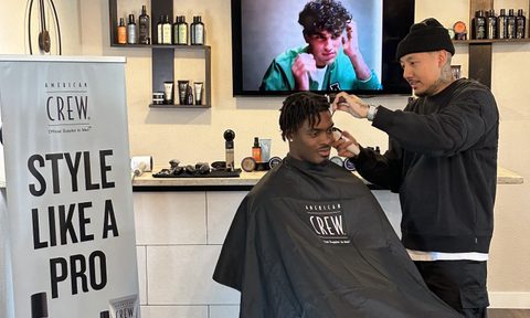 Malaki Starks with Vince the Barber