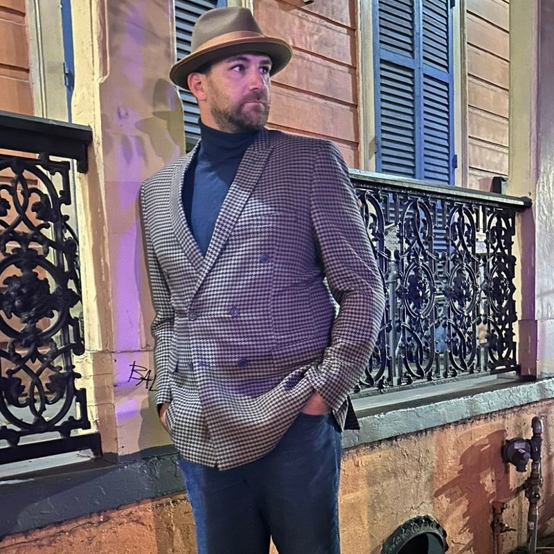 Man in blazer and jeans