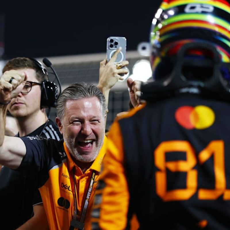 McLaren CEO Zak Brown enthusiasticlly greets 2025 Bahrain GP winner Oscar Piastri.