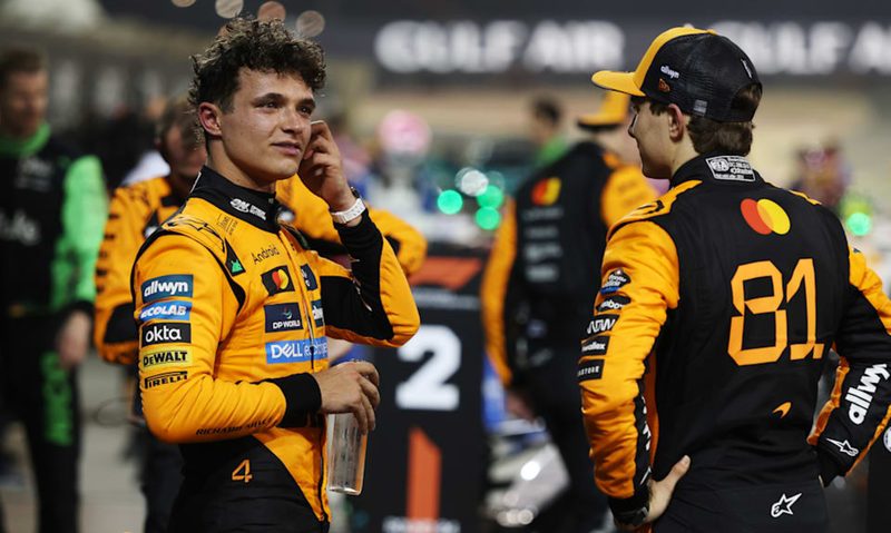 McLaren drivers Lando Norris and Oscar Piastri after the 2025 Bahrain Grand Prix.