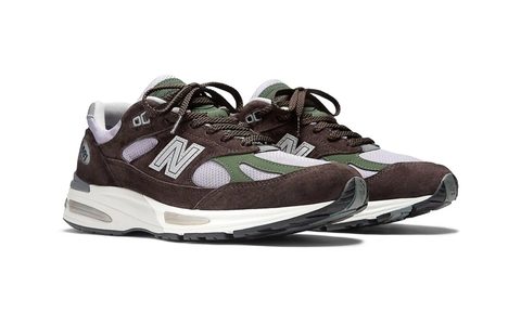 pair of brown new balance sneakers