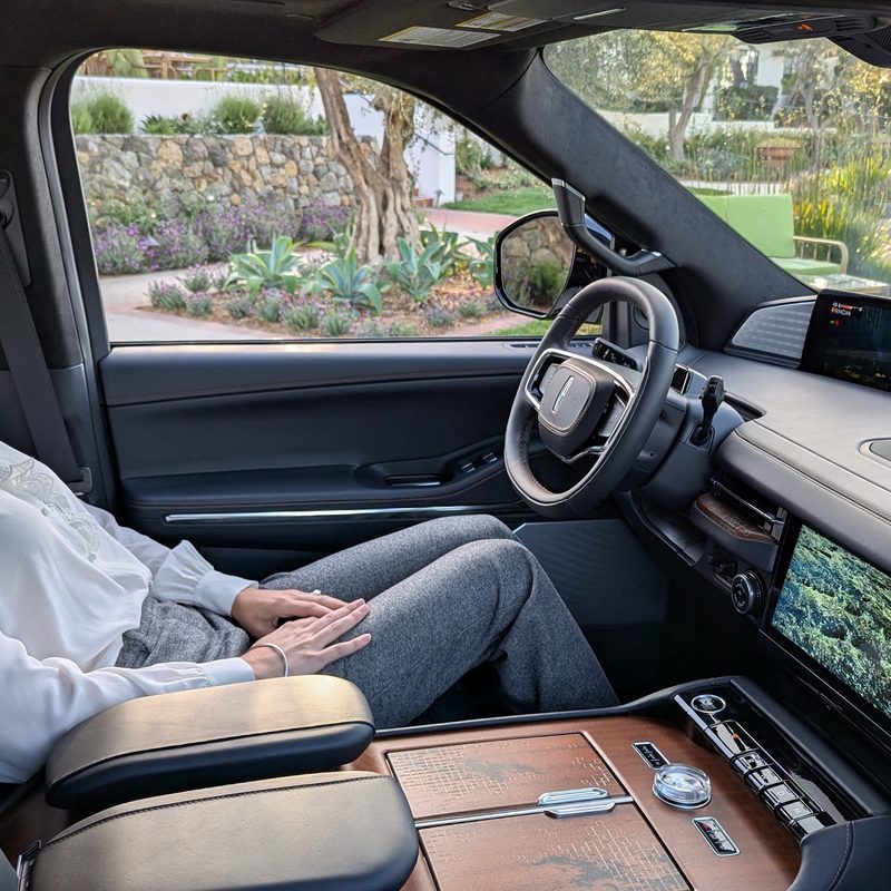 Blonde woman enjoying the 2025 Lincoln Navigator's "Rejuvenate Experience"