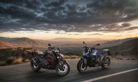 Two versions of the BMW R 1300 R parked on asphalt with distant hills and a city in a valley.