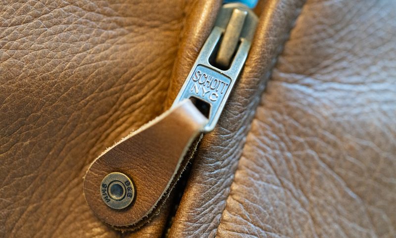 Zipper detail of a Ball and Buck x Schott NYC Leather Jacket.
