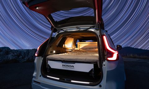 Honda CR-V Dream Pod concept SUV with star trails in the background.