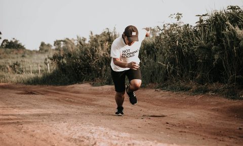 man running sprinting fast.