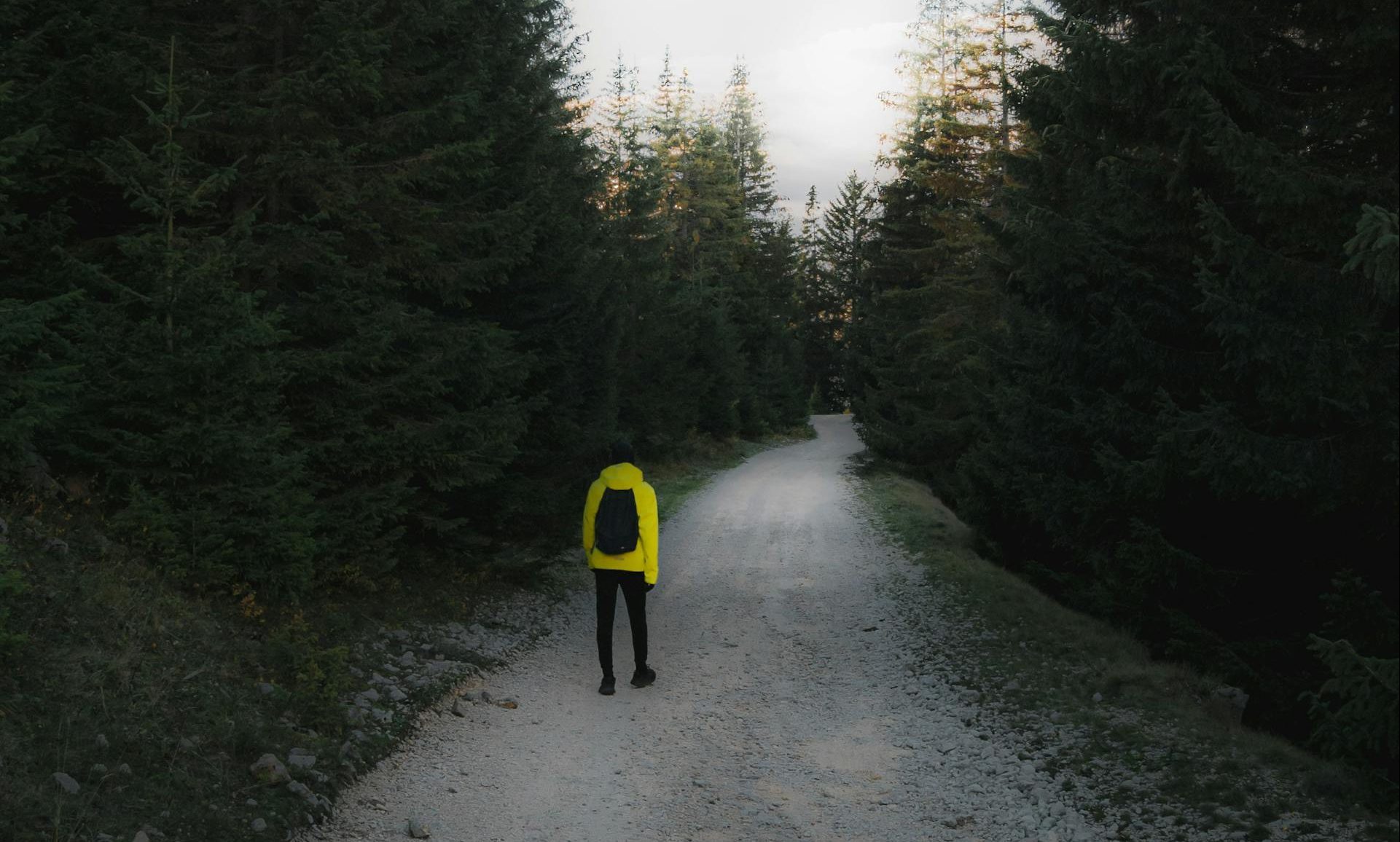 Man walking outside hiking rucking