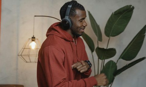 man dancing wearing headphone